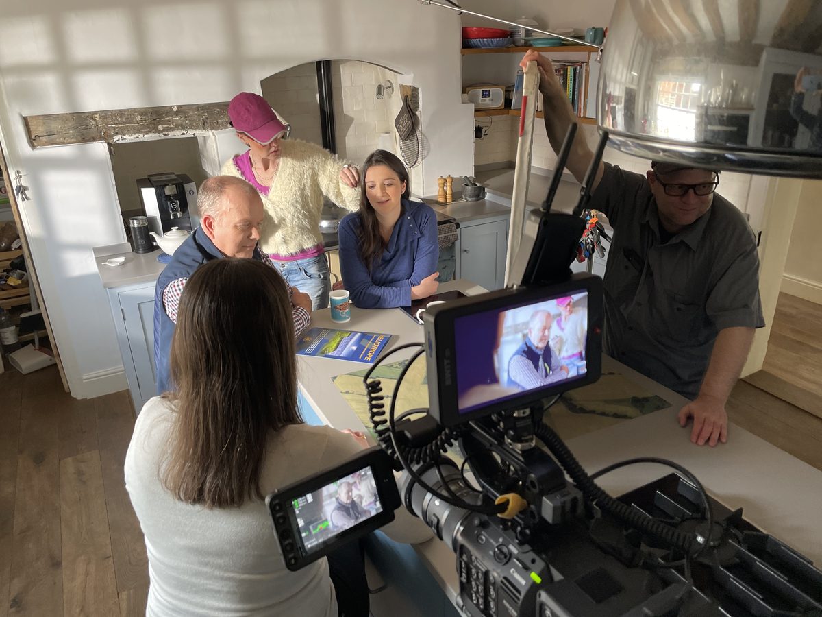Filming the Birketts commercial with actors, on set