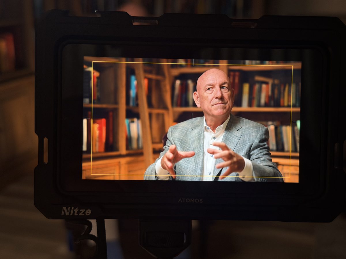 An interview seen on the director's monitor